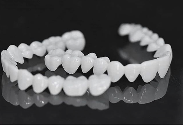 Adjustable White Dental Prosthesis for Instant Smile Correction